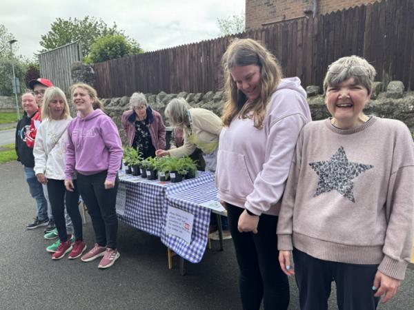 acomb gives back
